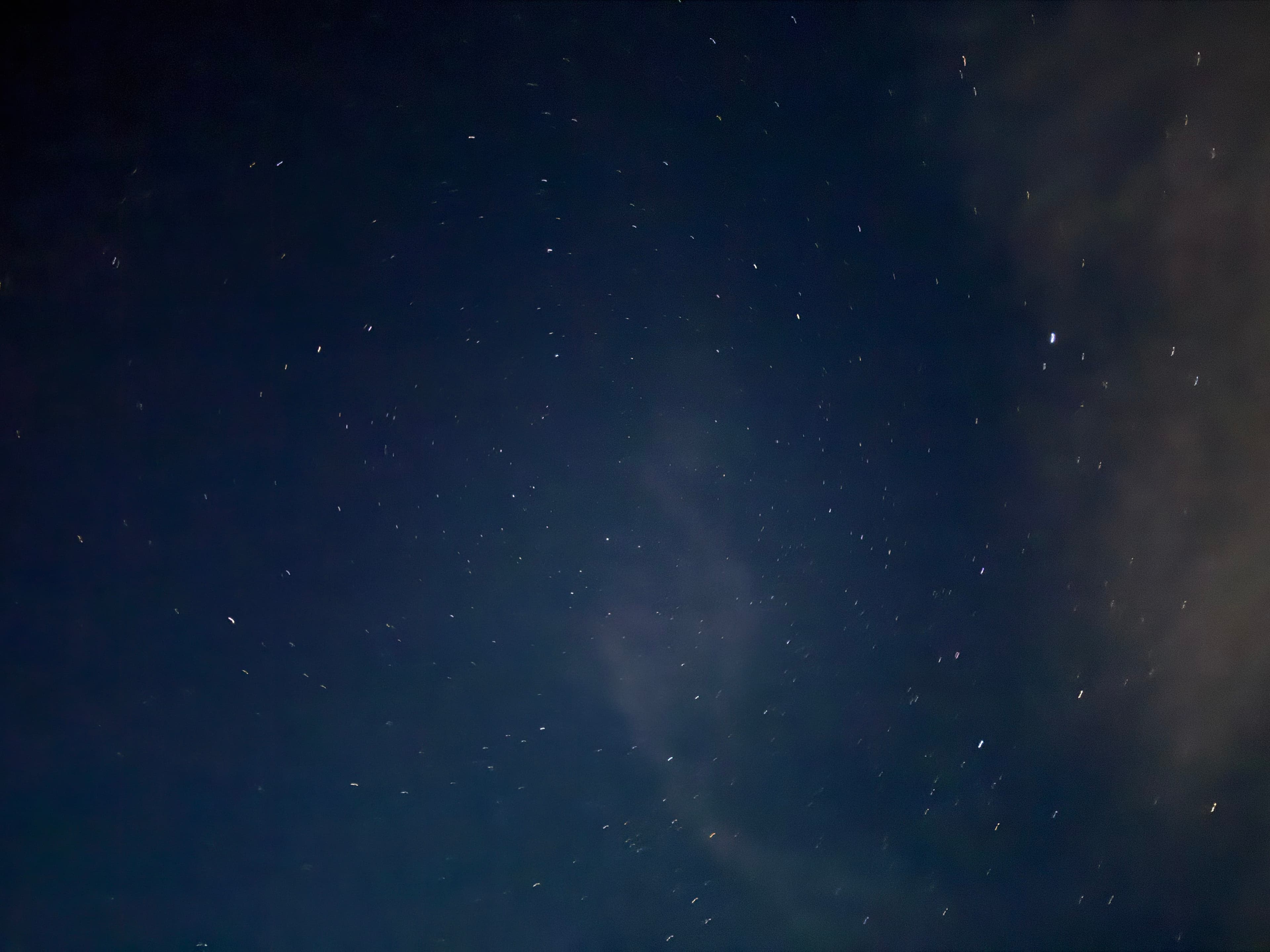 Stars twinkle in the dark Wyoming sky.